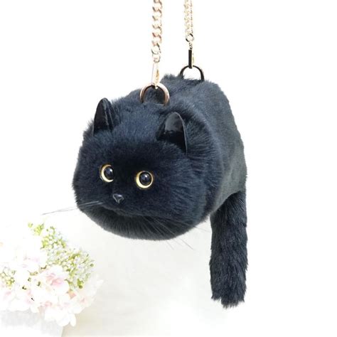 Realistic cat handbag .